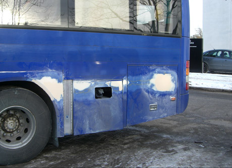 Partiel lakering af bus